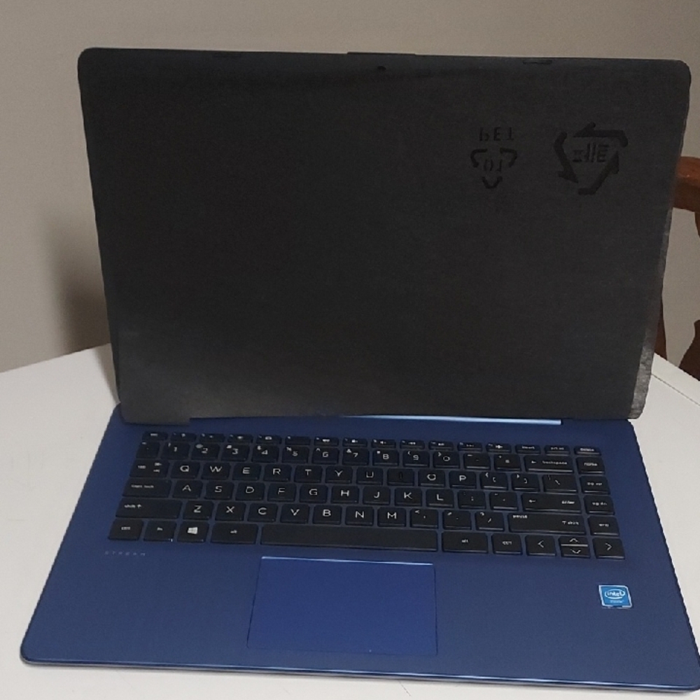 Blue Laptop with Black Cover
